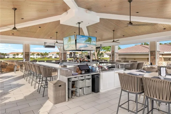 Popular Oasis Bar perfect stop after 18 or to gather with friends for a casual outdoor dining experience.