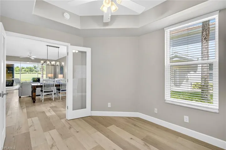 Shaker style French doors with glass flow into the living space from your flex den/office