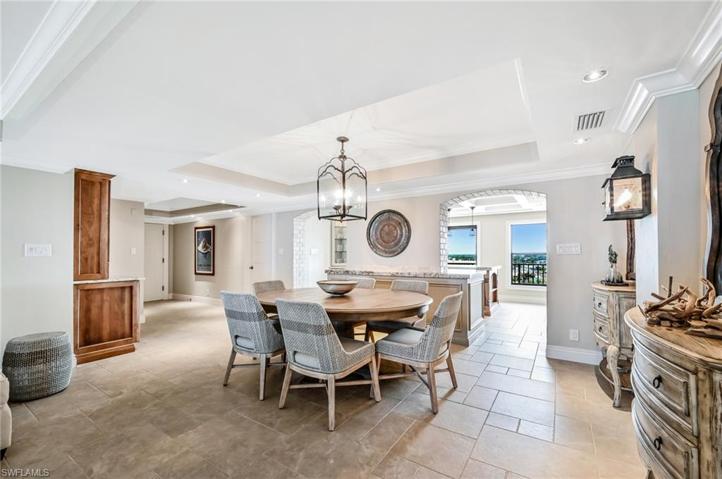 The formal dining area is steps from the gourmet kitchen