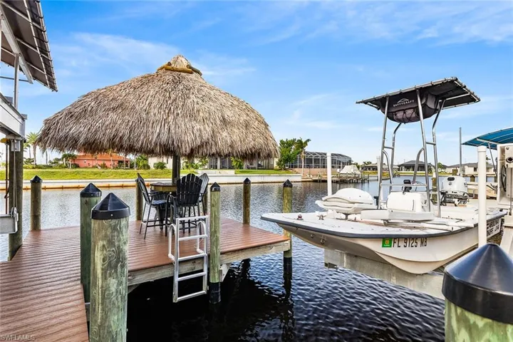View of dock featuring a canal view
