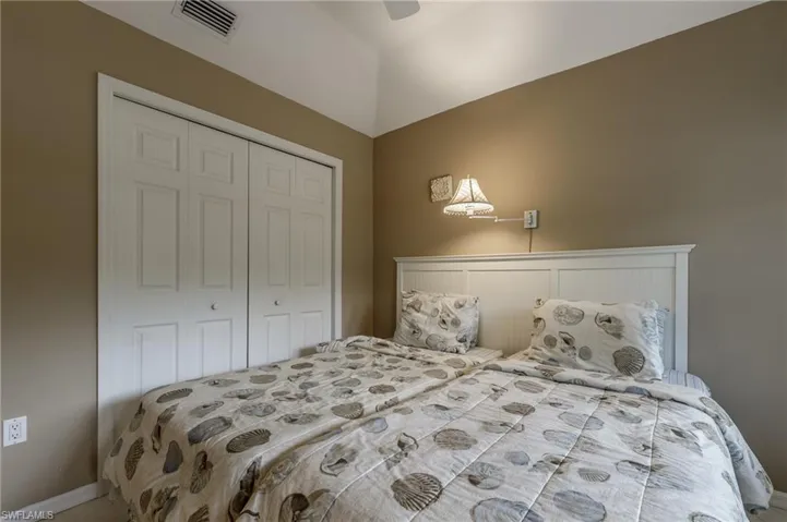 Bedroom featuring a closet and ceiling fan