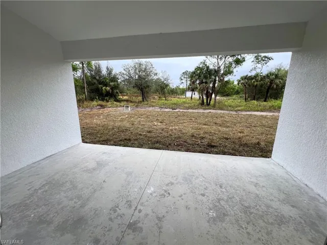 View of patio / terrace overlooking the half acre lot.