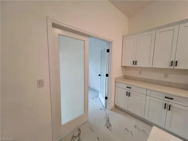 French Doors leading to the den