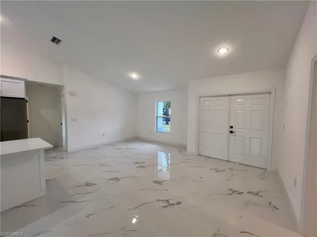 View of entry foyer and dining room.
