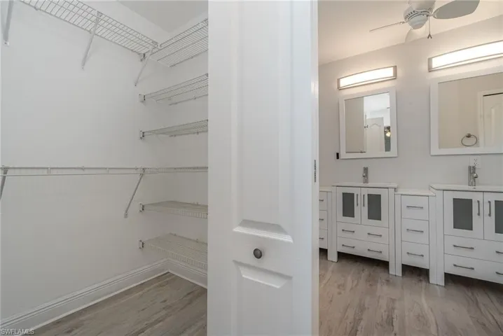 One of two primary bedroom walk in closets