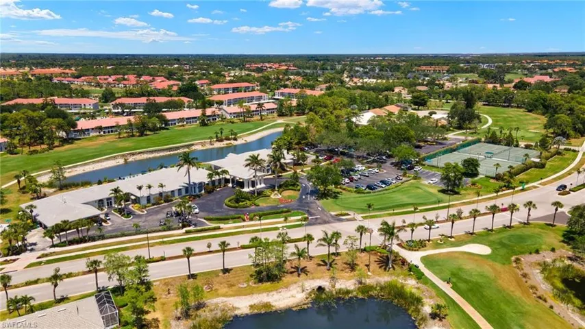 Birds eye view of property featuring a water view, golf course view, and a residential view