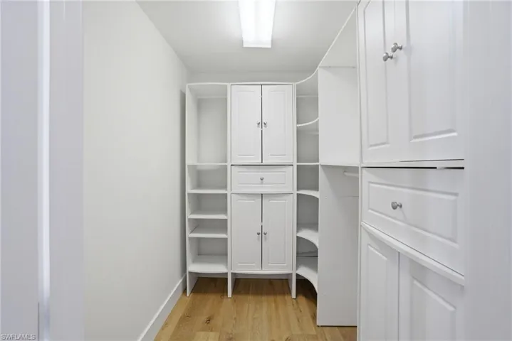 Guest bedroom has a walk in closet