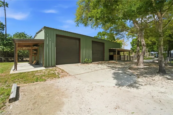 There is also a large detached garage with tall doors allowing for tons of different “toys”