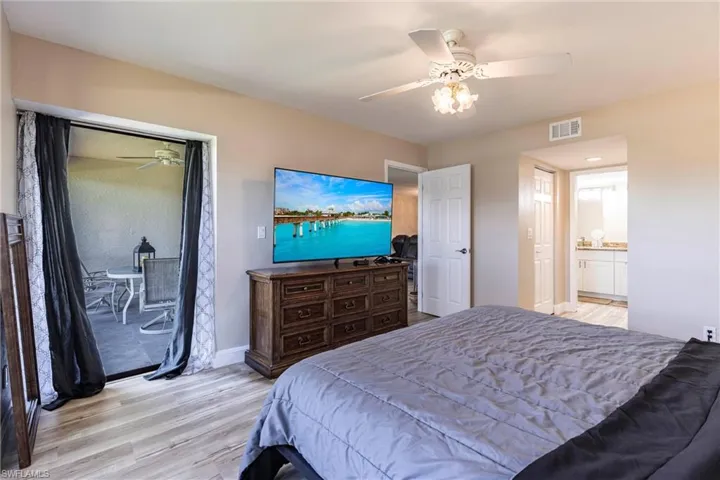 Bedroom featuring light wood-style floors and a ceiling fan