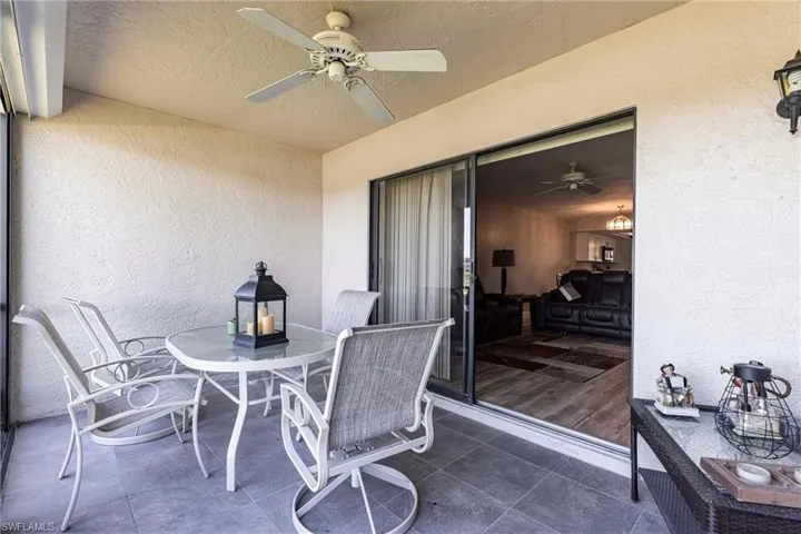 View of patio with ceiling fan