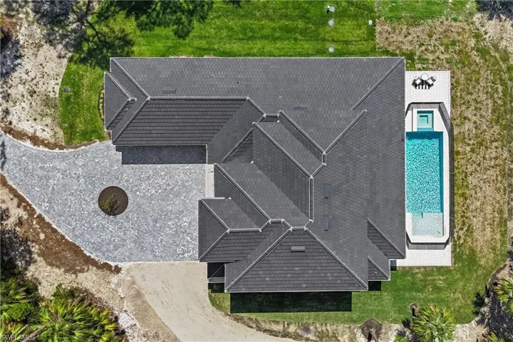 View from above of property featuring a pool area