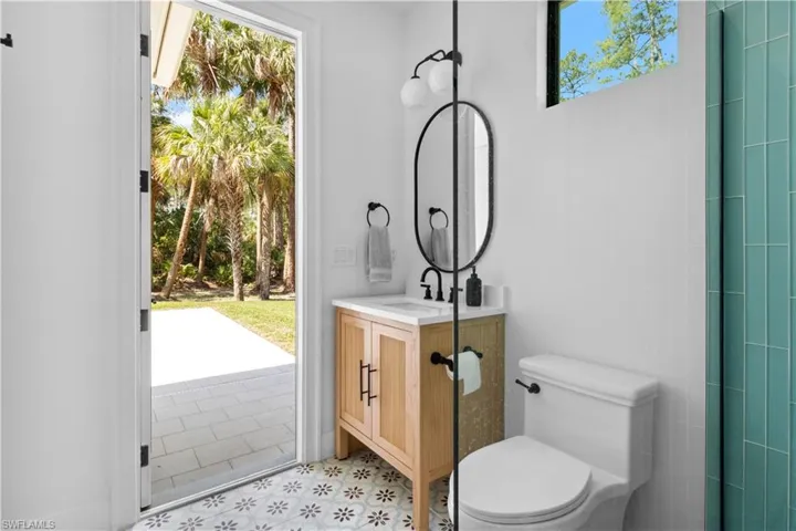 Bathroom with toilet and vanity