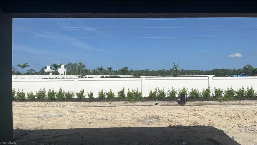 Backyard view (Fence owned by community)