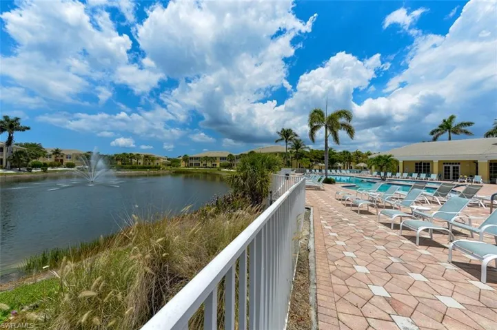 Lakefront Resort Style pool and spa with fountain view, a huge pavered sundeck with covered and sunny seating & a BBQ area!