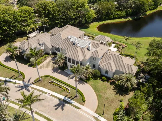 Aerial view of estate with lake