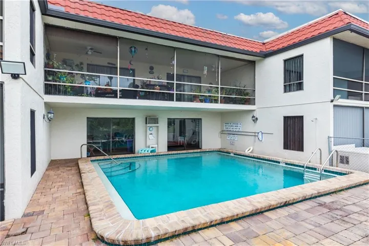 View of swimming pool with a patio