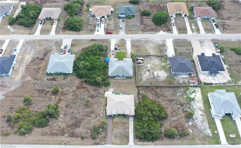 Aerial view of the duplex and suburban area