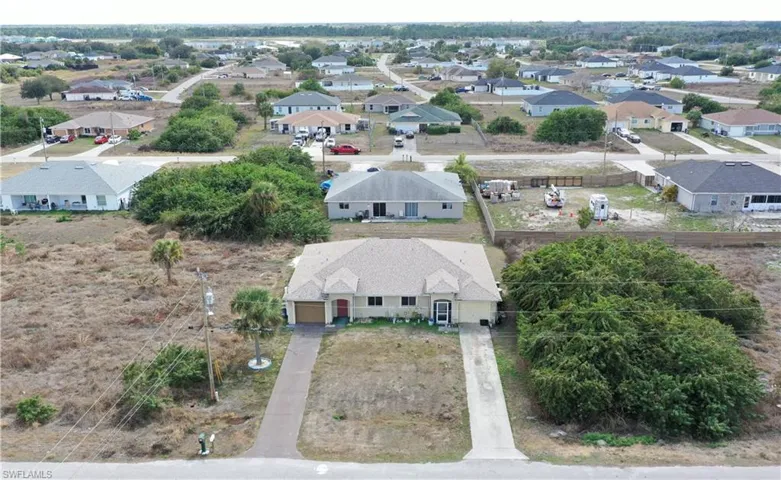Aerial view of the duplex and suburban area