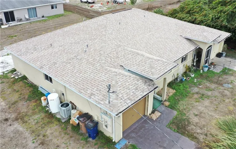 Left side aerial view of the duplex