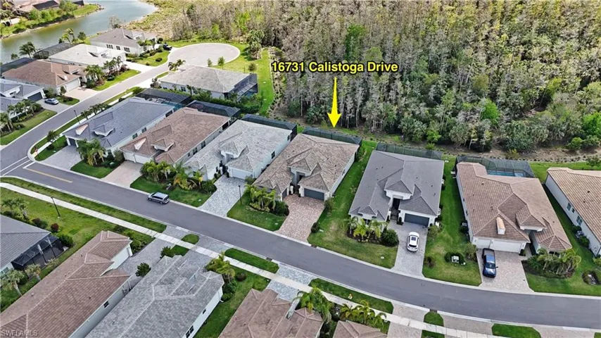 Bird's eye view with a residential view and a water view