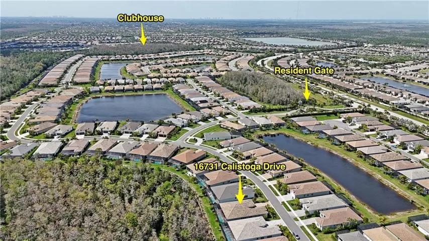 Birds eye view of property featuring a residential view and a water view