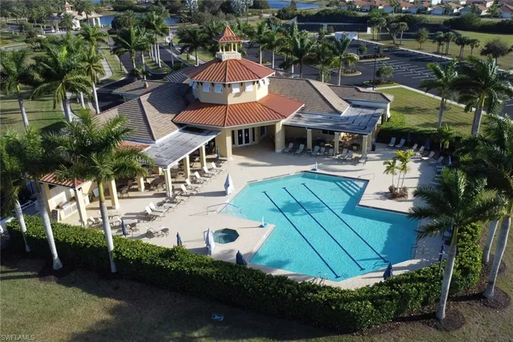 Community pool with a patio area