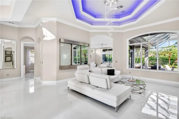 Open and bright with views of expansive lanai and pool.