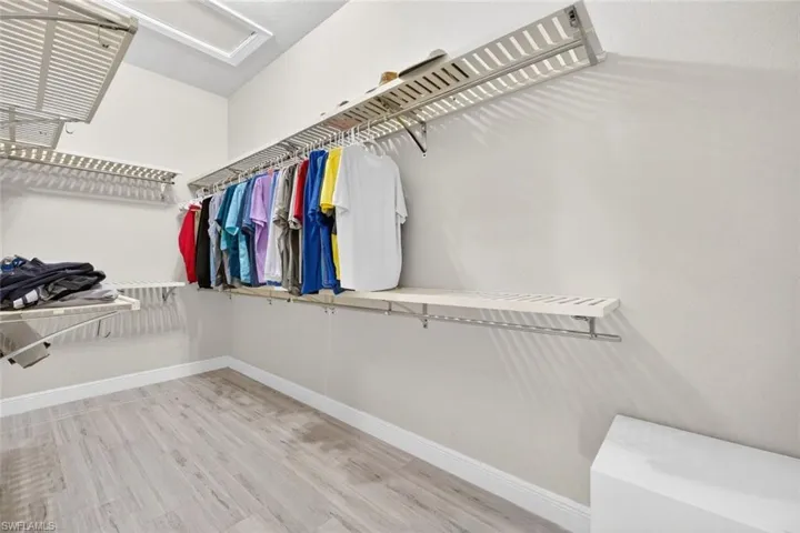 One of two large walk-in closets.