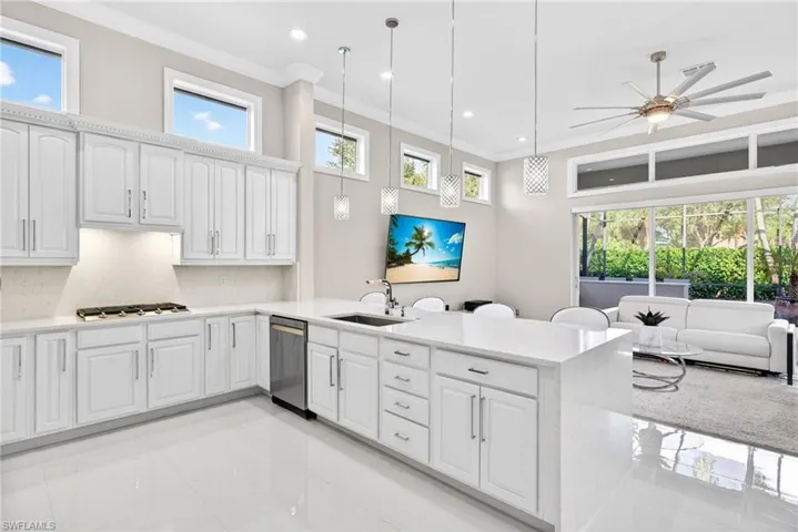 Open kitchen to family room makes for easy entertaining.