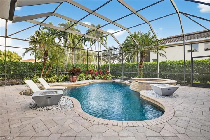 Secondary view of pool, spa and natural gas fire feature.