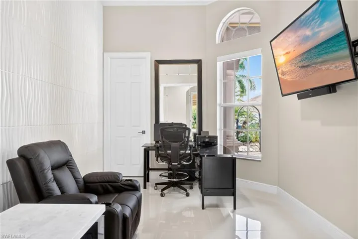 Fourth bedroom is perfect for a guest suite, home office or workout area with dimensional white accent wall. Full bath located across the hall.