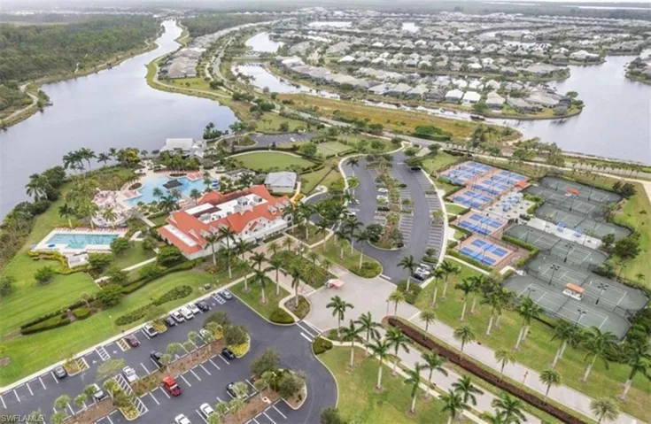 Expansive water features, multiple tennis courts, several pickleball courts, and resort-style swimming pools