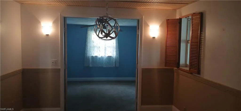 Looking from Dining Area into Office/Den