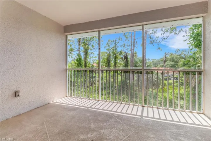 Unfurnished sunroom with healthy amount of natural light