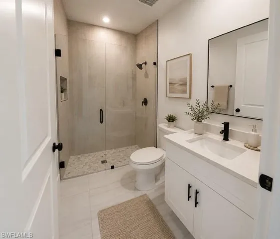 Stylish full guest bathroom conveniently located near the secondary bedrooms.