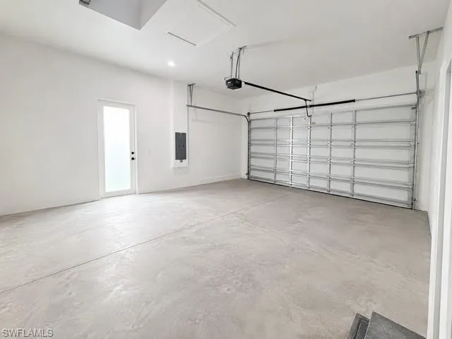 Attached two-car garage with plenty of space for parking and storage.