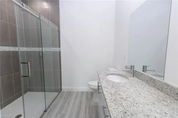 Master Bathroom featuring vinyl flooring