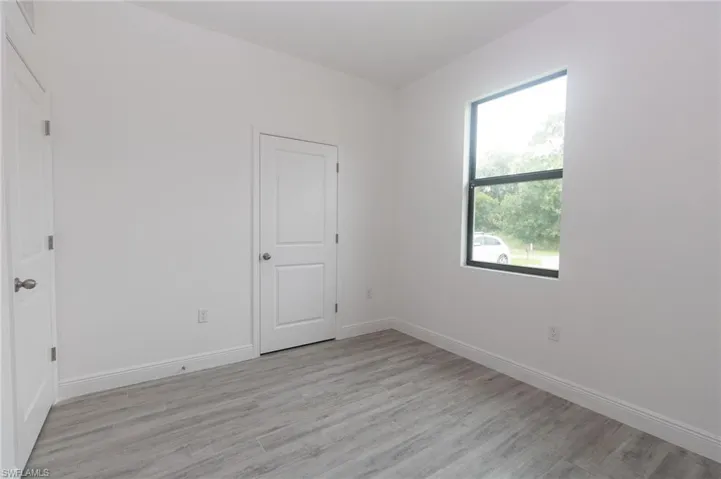 Bedroom featuring vinyl flooring