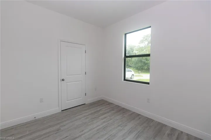 Bedroom featuring vinyl flooring