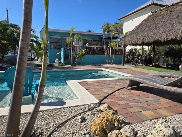 View of pool featuring a gazebo