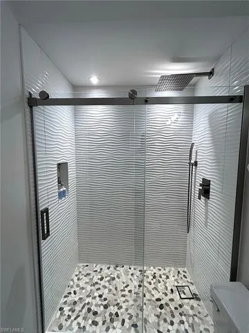 Bathroom with a shower stall