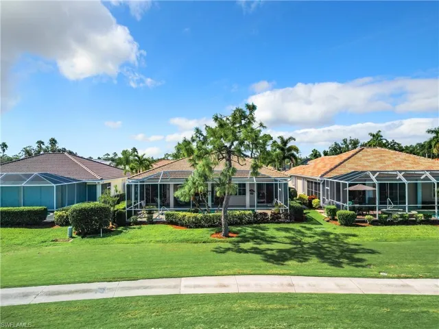 Ranch-style home rear view from the gold course