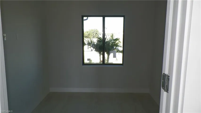 Empty room with baseboards