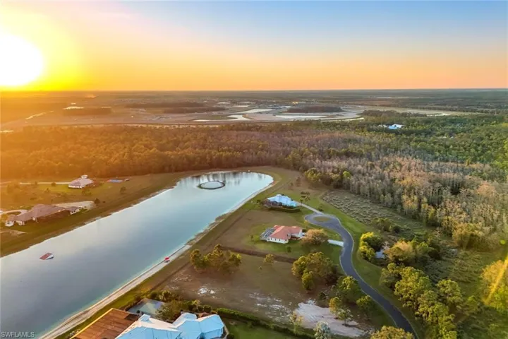 Aerial view at dusk with a water view