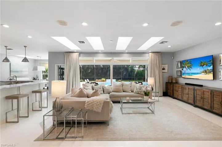 Open concept living with sliders that push into walls