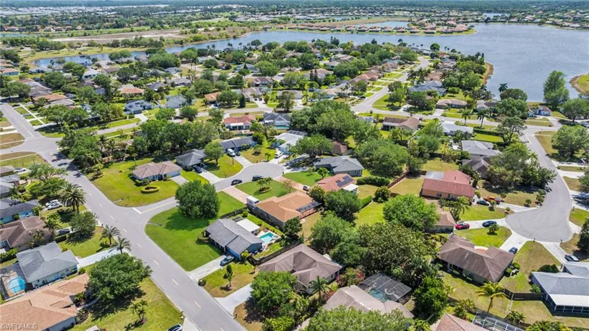 Drone / aerial view featuring a residential view and a water view