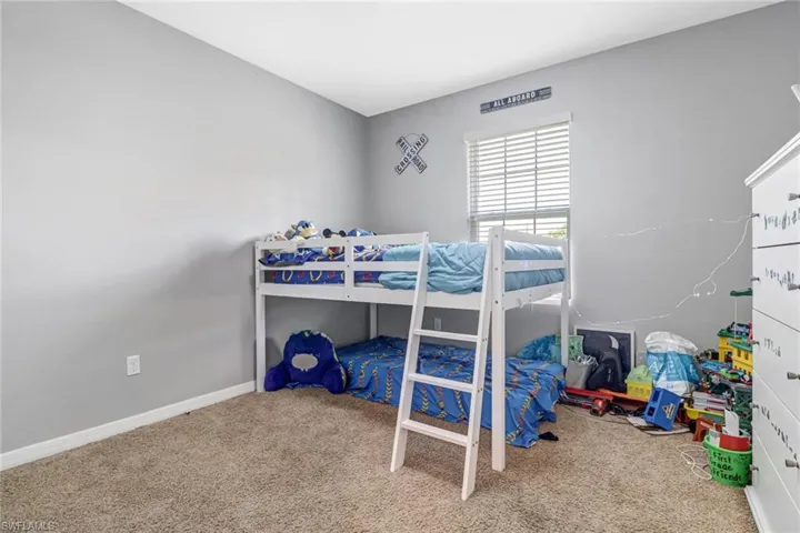 Bedroom featuring carpet flooring