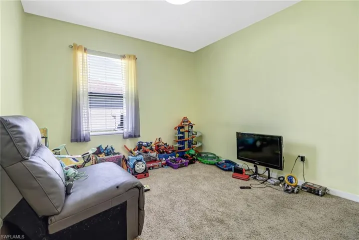 Playroom featuring carpet