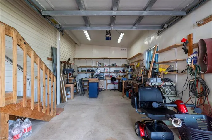 Garage featuring a workshop area