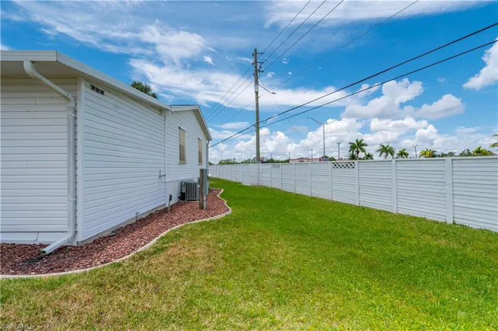 View of yard featuring central AC unit